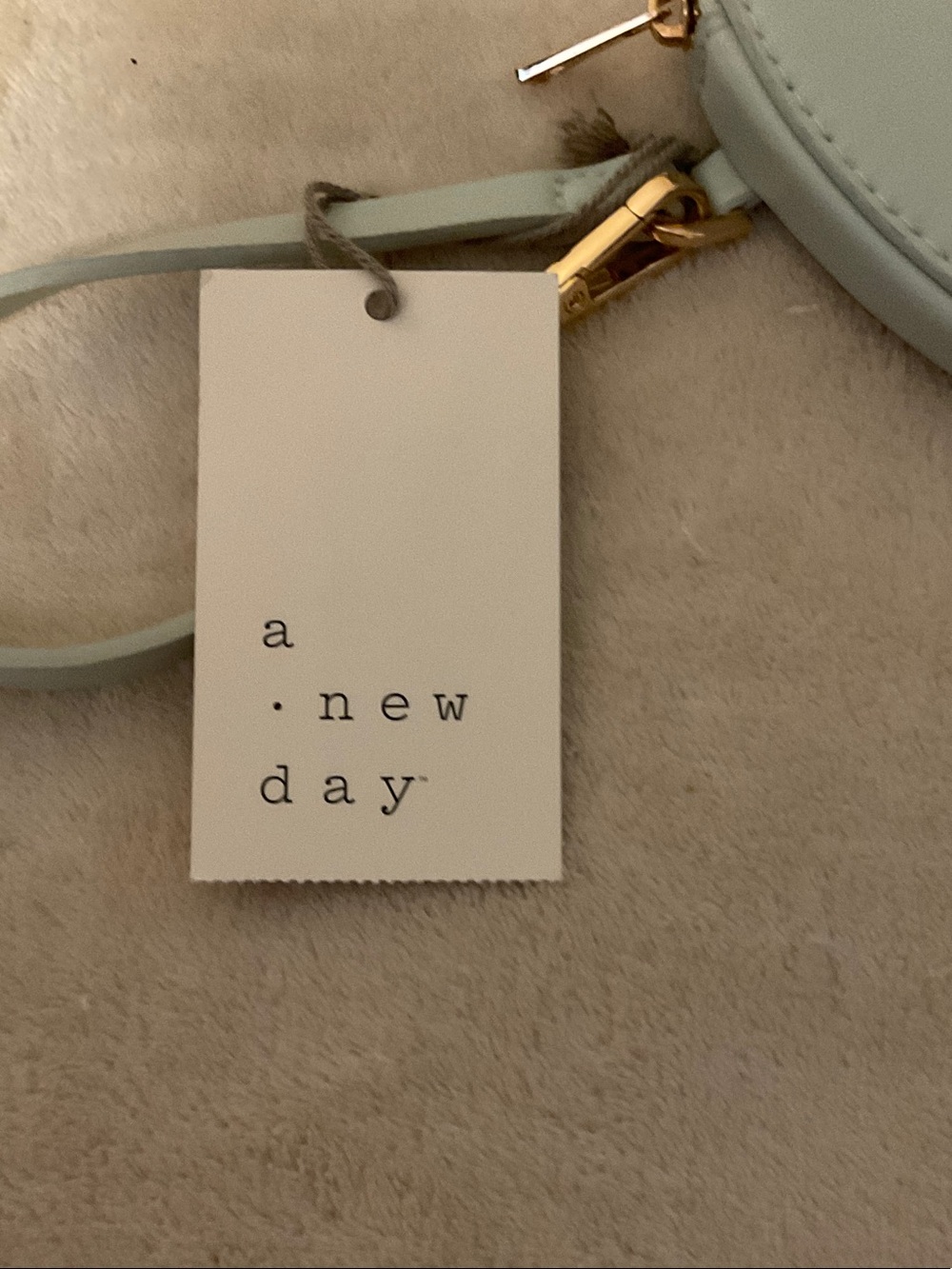 a new day Light Blue Heart Wristlet with Pink "TEXT ME" Detail - Picture 3 of 5
